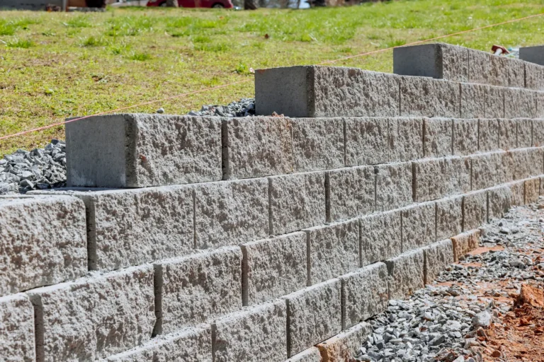 Retaining Walls & Block Foundations: Managing Autumn Drainage & Hydrostatic Pressure
